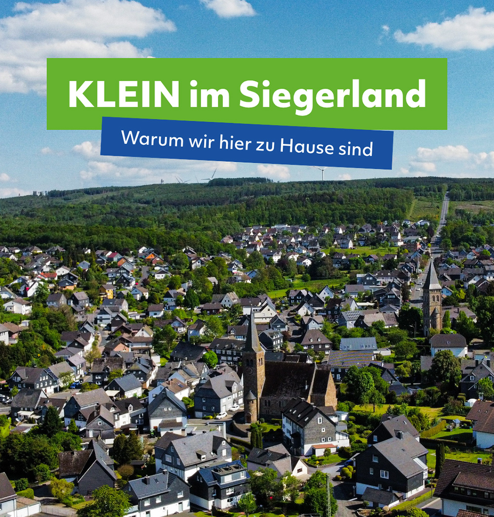 Übersichtliches Luftbild einer Gemeinde im Siegerland mit Titel „KLEIN im Siegerland“, das die regionale Herkunft und den Unternehmensstandort Wilnsdorf betont.